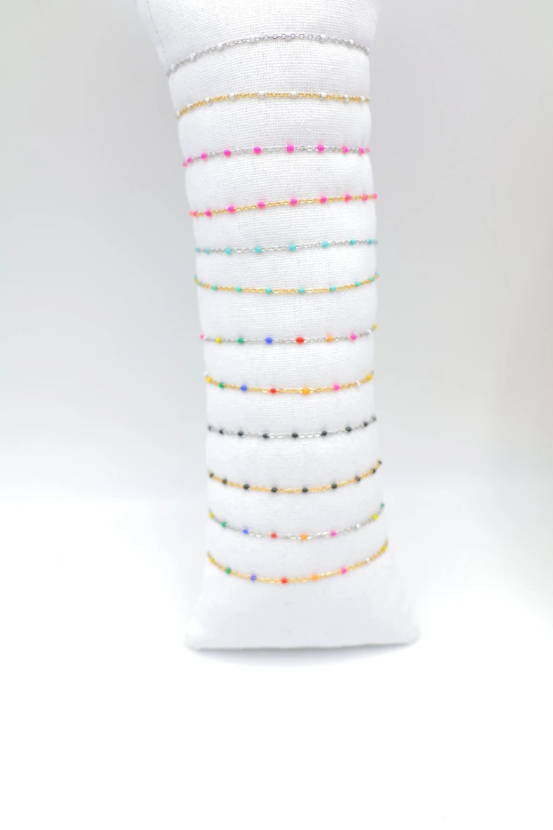 Pack of 12 stainless steel bracelets with cushion — Multicolor