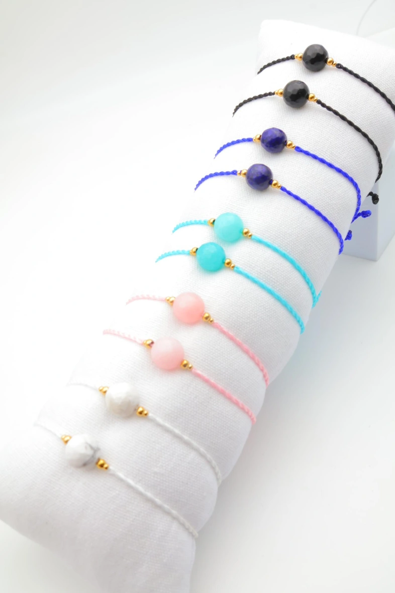 Pack of 12 stainless steel bracelets with cushion — Multicolor