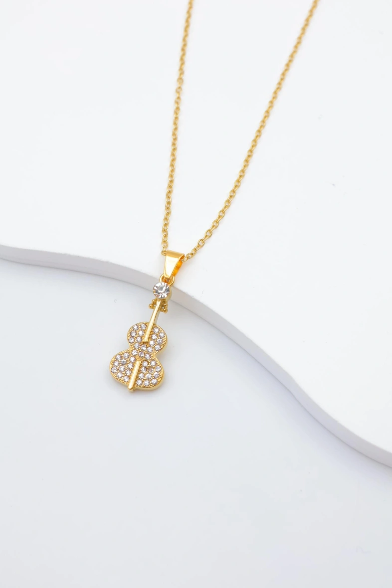 Necklace with violin-shaped pendant decorated with mini rhinestones and a small crystal. 4