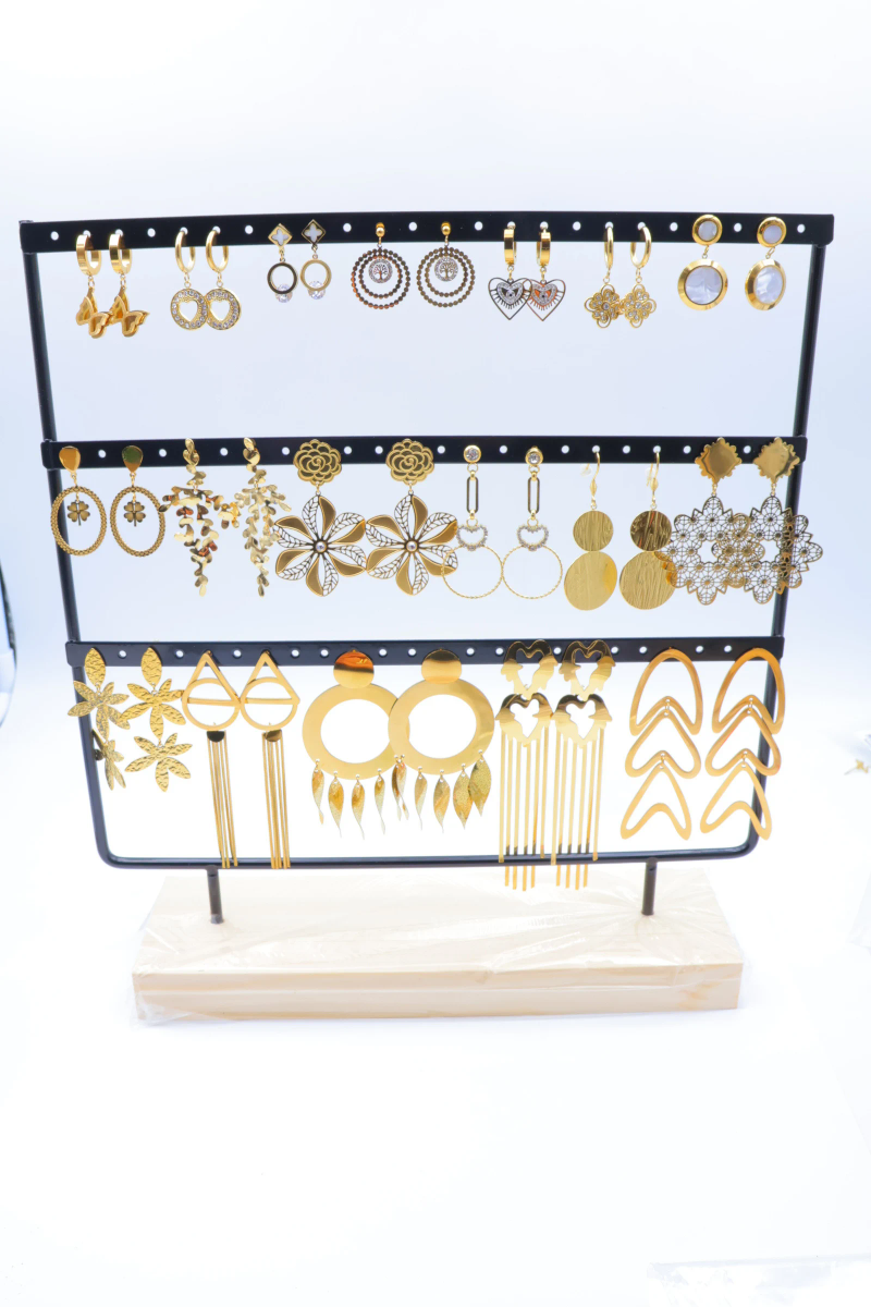 Display with 15 golden ear nails 2