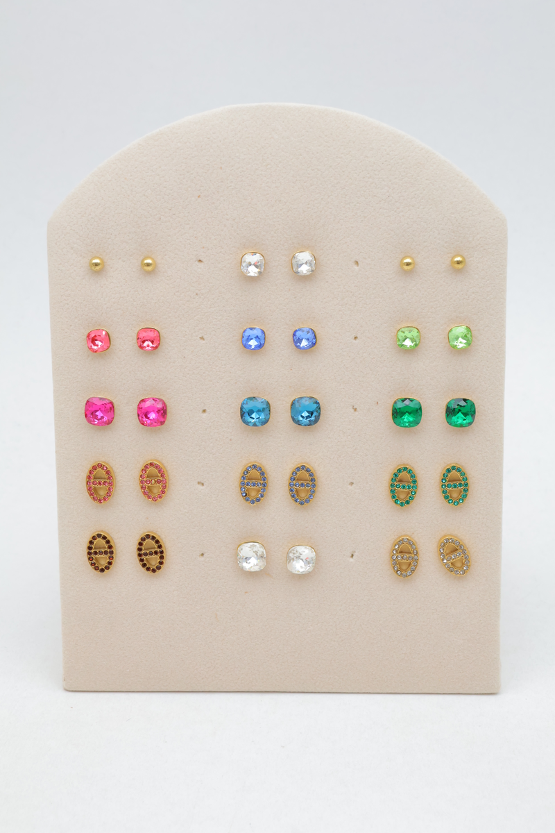 Set of 16 pairs of assorted brown earrings, made of stainless steel, on a metal display — Multicolor