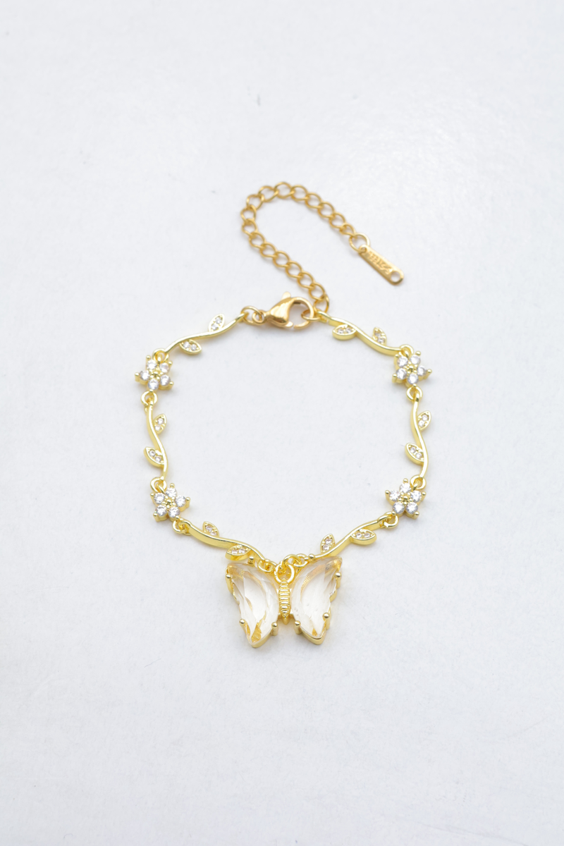 Bracelet chaîne fine papillon et fleurs
